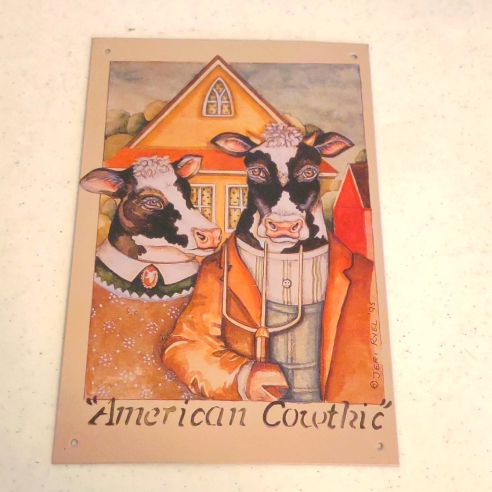Vintage metal cow sign